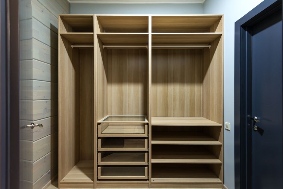 Pull out closet drawers showcasing detailed organizer systems